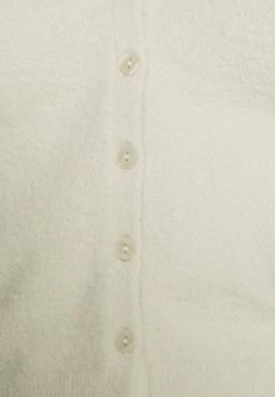 Abercrombie & Fitch SLIM FUZZY SHORT CARDI CHAIN - Cardigan - Cream -Abercrombie & Fitch Shop 0643cd943eb3454fb614e000d298eec3