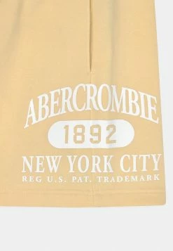 Abercrombie & Fitch MAR OVERT LOGO ABOVE THE KNEE - Shorts - Yellow -Abercrombie & Fitch Shop 325339a34e764be6ab51fd569bb2b227