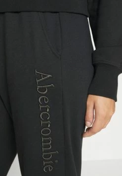 Abercrombie & Fitch LONG LIFE SUNDAY - Tracksuit Bottoms - Black -Abercrombie & Fitch Shop 9fd462d7919441a1a52bac1d90652ae0