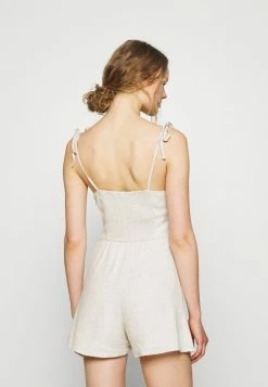 Abercrombie & Fitch MICRORUFFLE BARE ROMPER - Jumpsuit - Off-white -Abercrombie & Fitch Shop bafce3ac45df4c6494660f903d58e6b2