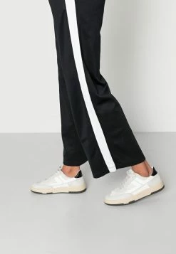 Abercrombie & Fitch LNY TRICOT WIDE LEG - Tracksuit Bottoms - Black -Abercrombie & Fitch Shop d6ba7fead18548debd313d27570cf478