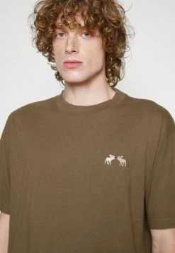 Abercrombie & Fitch EXCLUSIVE QIXI TEE UNISEX - Basic T-shirt - Khaki -Abercrombie & Fitch Shop db504c7f69064ab99ecd38f9640e5786